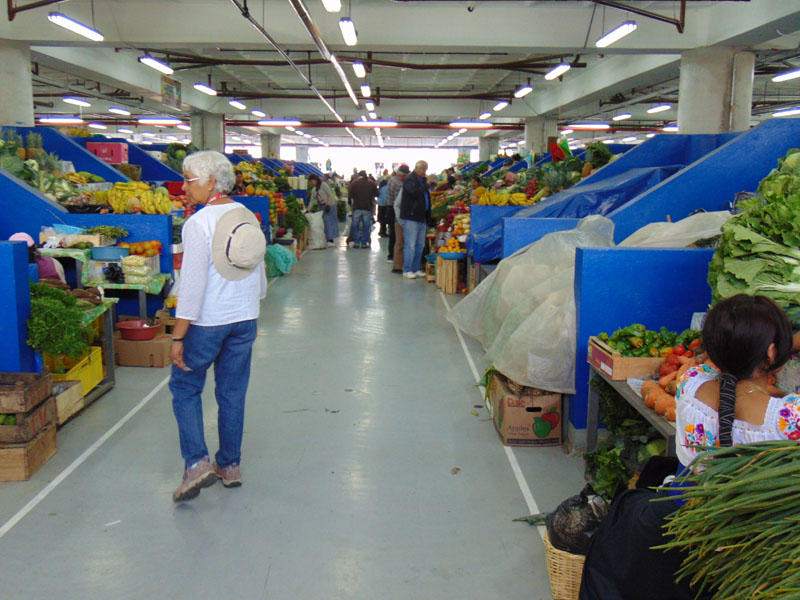Vegetable shops in the food market in Otavalo, Ecuador