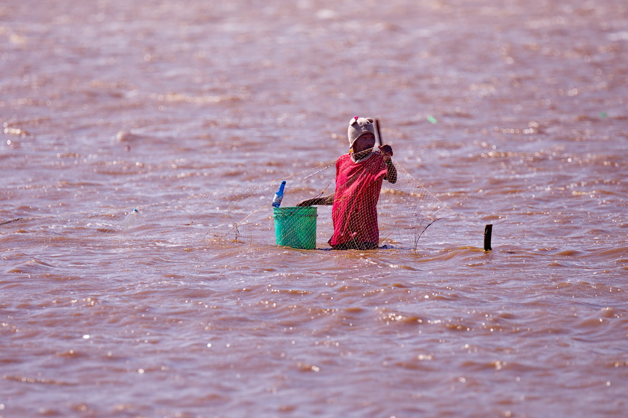Fisherman checking his nets