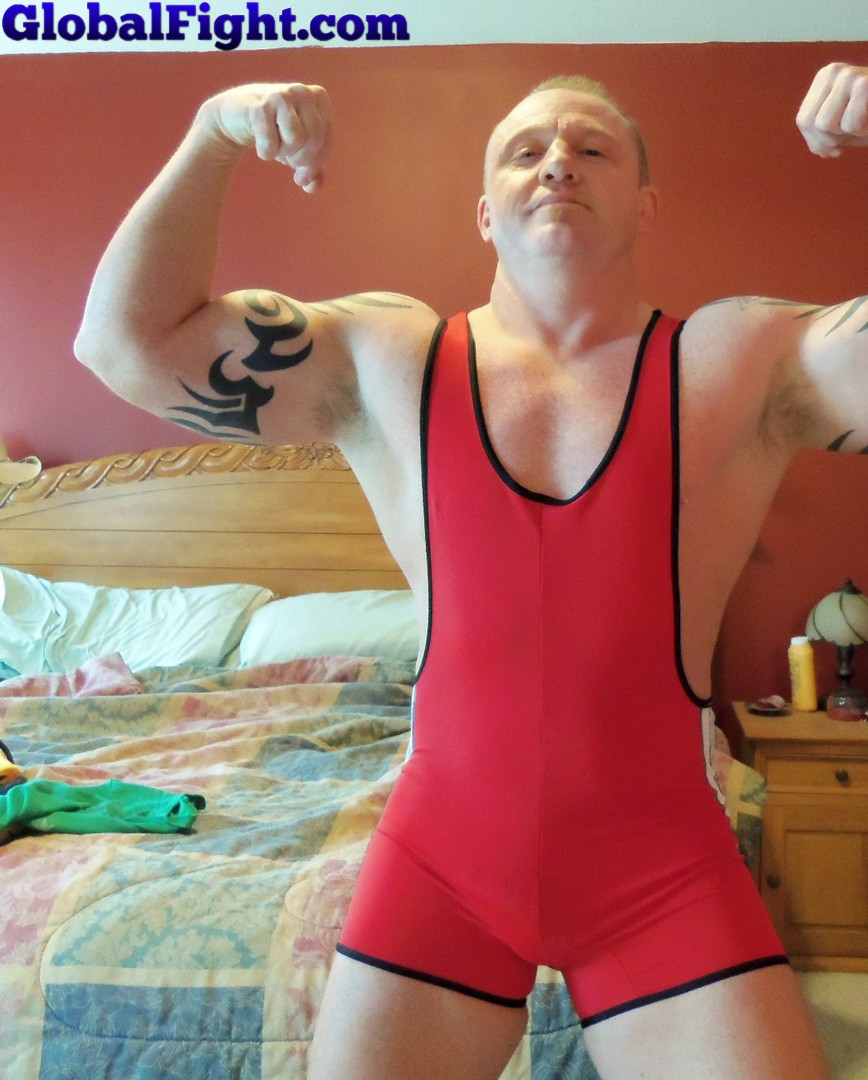 muscle jock wrestler flexing.jpg