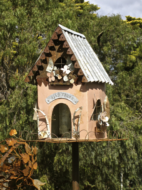 2. An outdoor house or garden decoration - Bird House