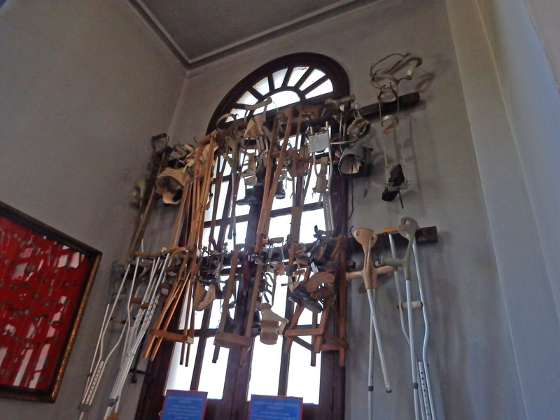 6 People leave their crutches in the church after their miracle.jpg