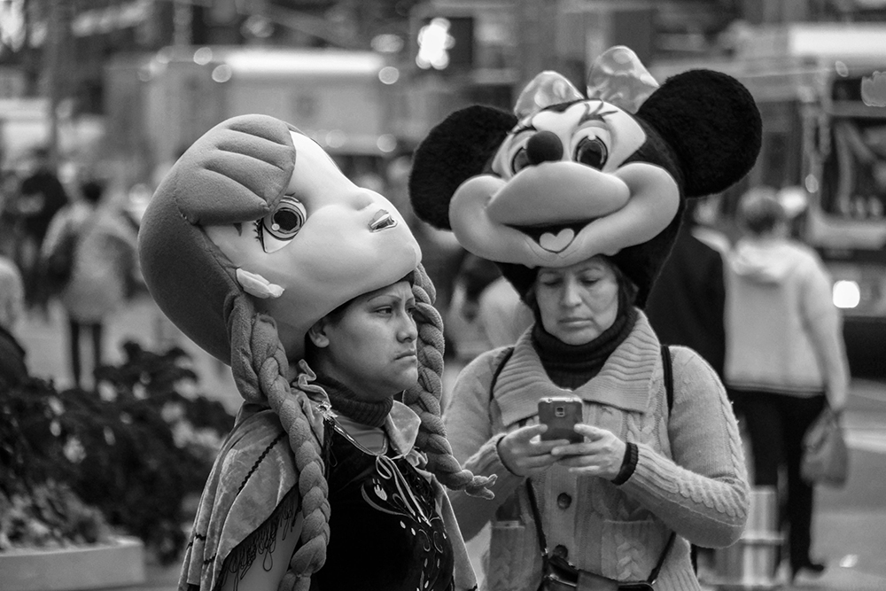 Under the masks, Times Square, New York City, New York, 2016