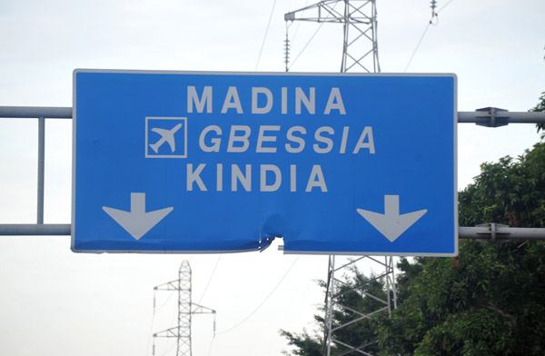 Road sign in Conakry on the road to Gbessia Airport