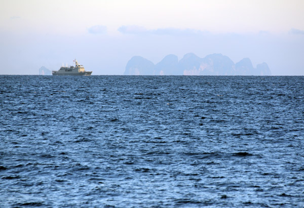 HTMS Narathiwat (OPV 512 on the horizon with Koh Phi Phi Let
