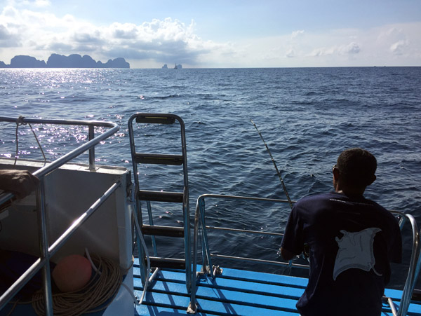 Fishing off the dive deck with Koh Phi Phi Lee