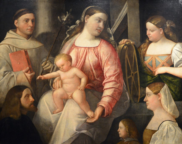 Madonna and Child with St. Anthony of Padua and Caterina D'Alessandria with three donators, Gianovanni Cariani (1480/85-1547)