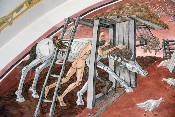 Jurginės - Spring: Shepherd removes the horse from the barn over a saw, representing wolves