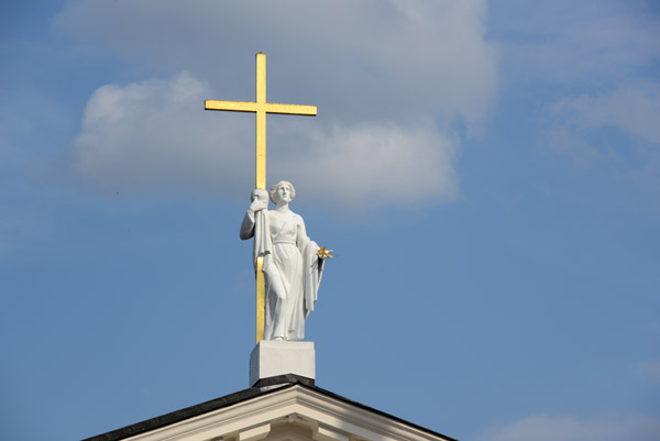 Statue of St. Helena supporting the cross in the center of the roof of Vilnius Cathedral