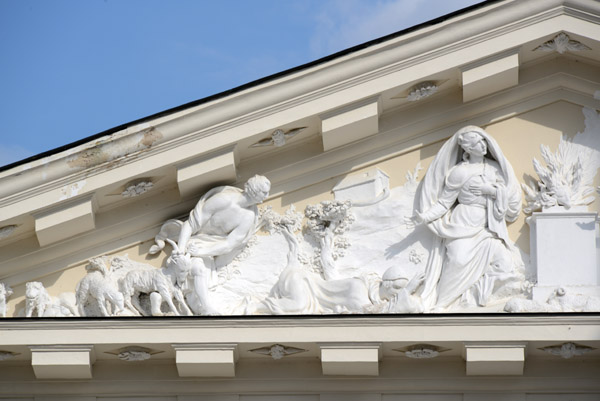 Detail of the left half of the pediment sculpture group showing the sacrifice of a goat, Vilnius Cathedral