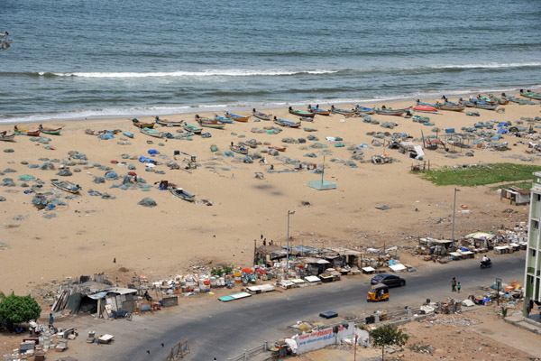 Foreshore Estates Beach with fishing boats, nets and roadside fish market