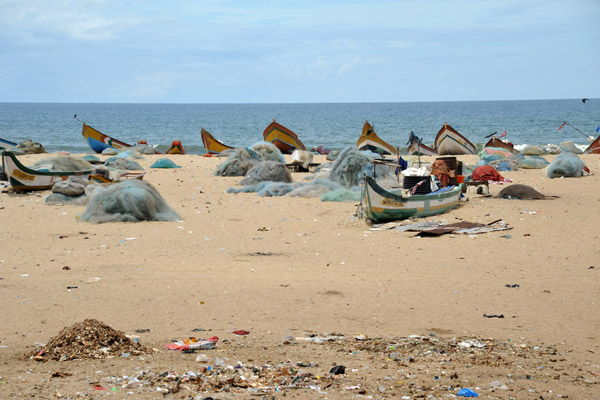Fishing boats and nets on the beach, Chennai