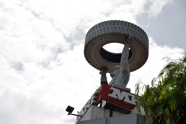 Atlas-style statue on top of MRF Tyres, Cathedral Road, Chennai