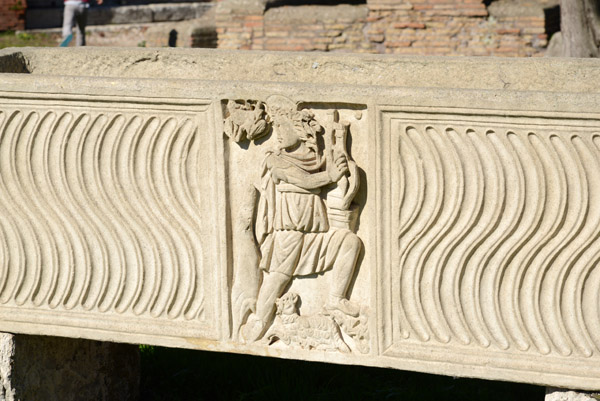Stone carving of the musician near the Theater, Ostia Antica