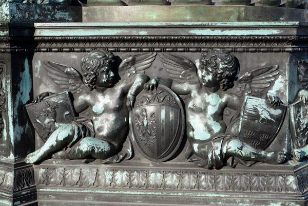 Cupids with coats-of-arms