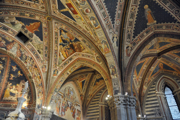 The ceiling of the Baptistry contains Vecchietta's fresco series Articles of Faith, Prophets and Sibyls