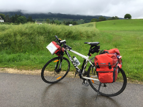 Entering Switzerland from Germany by bike on a rainy day