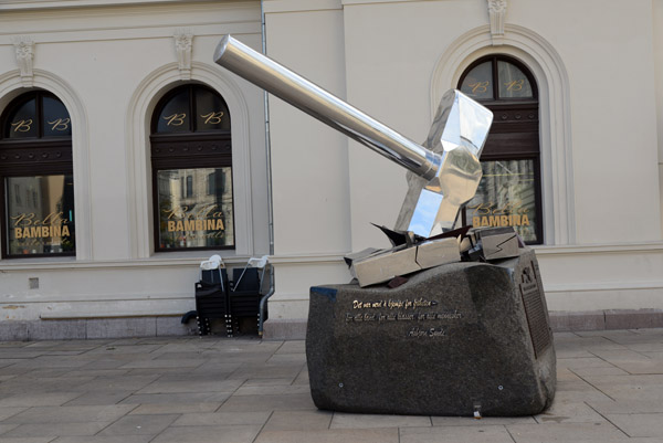 Monument to the Osvald Resistance Group, a hammer smashing a swastika, 2015
