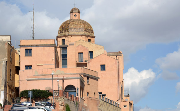 Via del Fossario with the dome of Cagliari Cathedral 