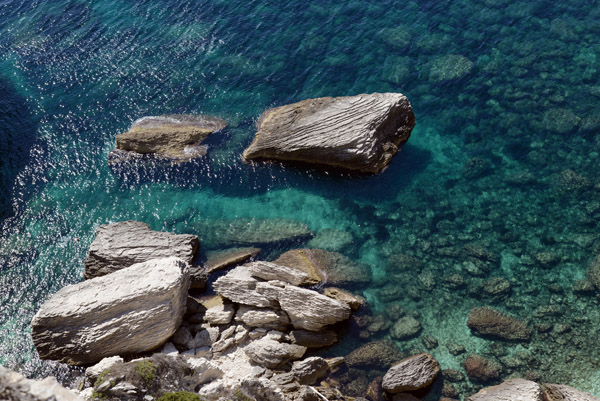 Clear Mediterranean waters off the rocky coast at Bonifacio