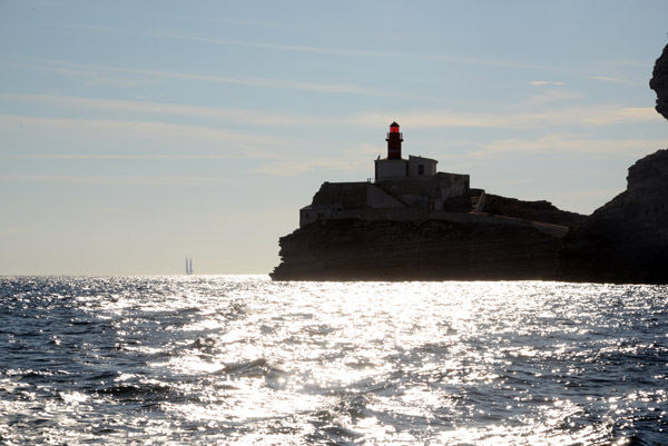 Afternoon sun silhouetting the Madonetta Lighthouse, Bonifacio