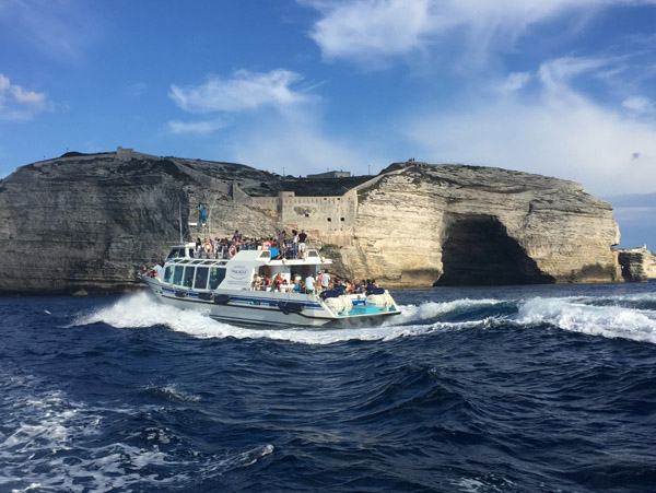 Another tour boat returning to Bonifacio Harbor