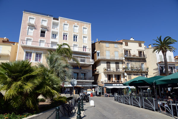 Restaurants and bars line the quai along the Port of Calvi