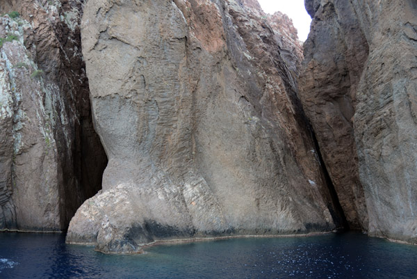 The cliffs around the Scandola Peninsula contain many grottos