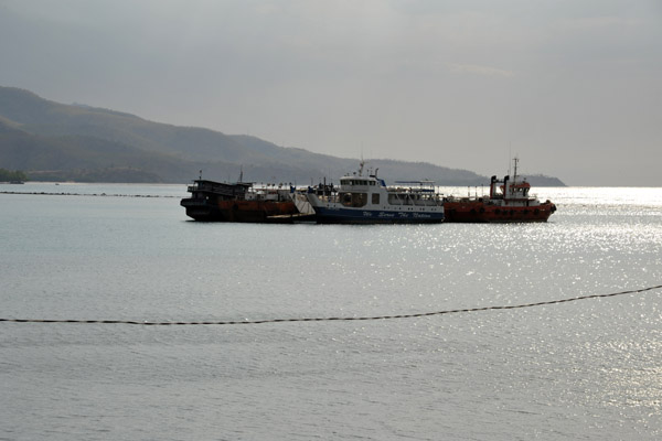 Ships including the Atauro Express ferry moored in Tibar Bay