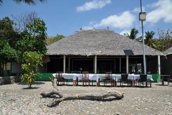 Waterfront restaurant with a thatched roof ready for a reception, Metiaut 