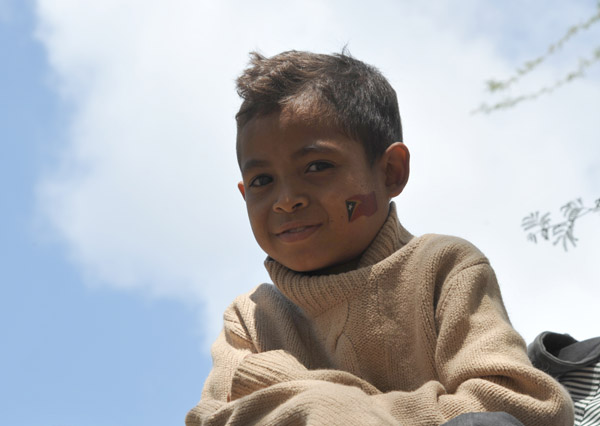 Young boy with a Timor-Leste flag on his cheek