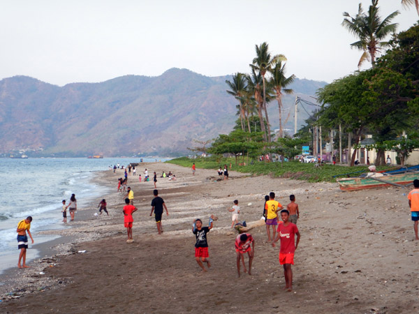 Beach football at dusk