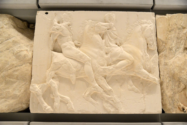 Horseman with a well built torso leaning back to rein in his galloping steed, Parthenon south frieze block 3 