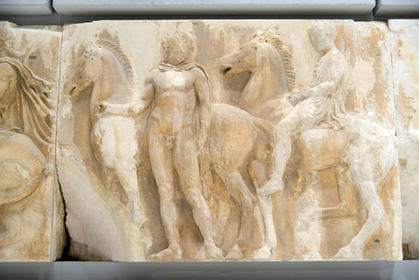 Nude rider standing beside his mount, Parthenon west frieze block 5