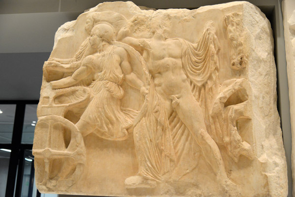 Charioteer and Apobate (he who gets off), north frieze of the Parthenon block 23
