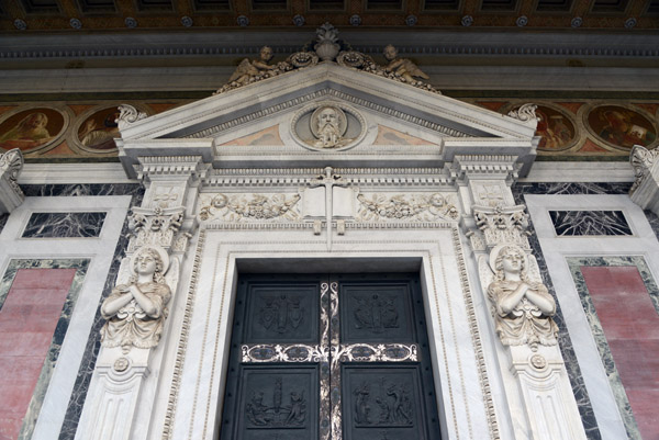 Bronze door with silver inlays depicting the lift of St. Paul, 19289-1931