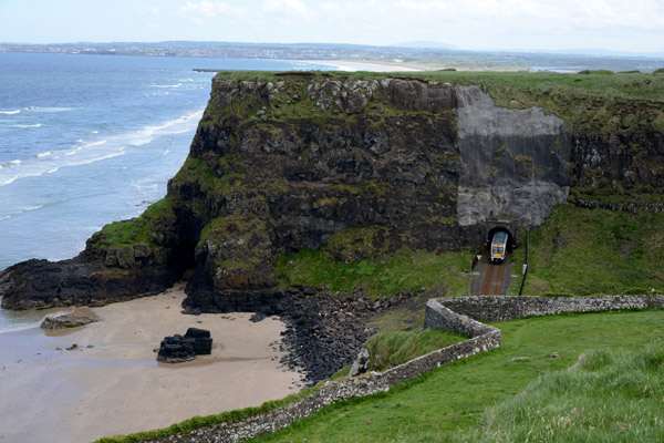 Railway tunnel passing through the cliff at Downhill Demesne along the Strand
