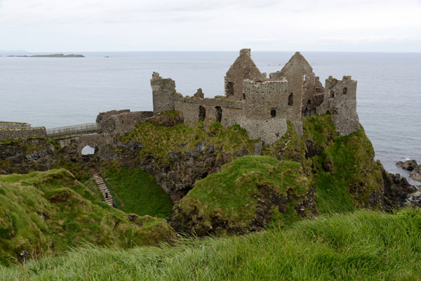 Ruins of Dunlace Castle situated atop the coastal cliffs