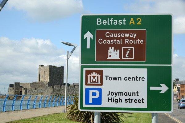 Causeway Coastal Route as it passes Carrickfergus Castle on the way to Belfast