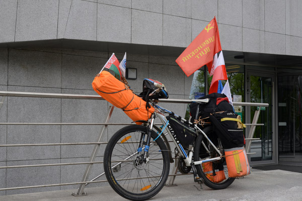 Cycle tourist stopping to visit the Great Patriotic War Museum, Minsk