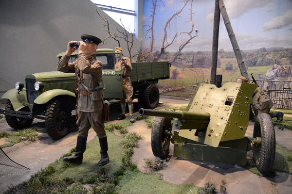Lifesize diorama of a Soviet officer and an anti-tank gun and 1932 GAZ-AA Truck
