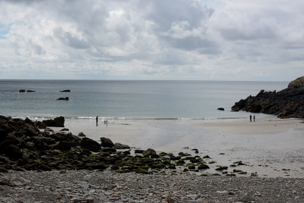 Le Petit Bôt Tower protests the small beach at Petit Bôt Bay