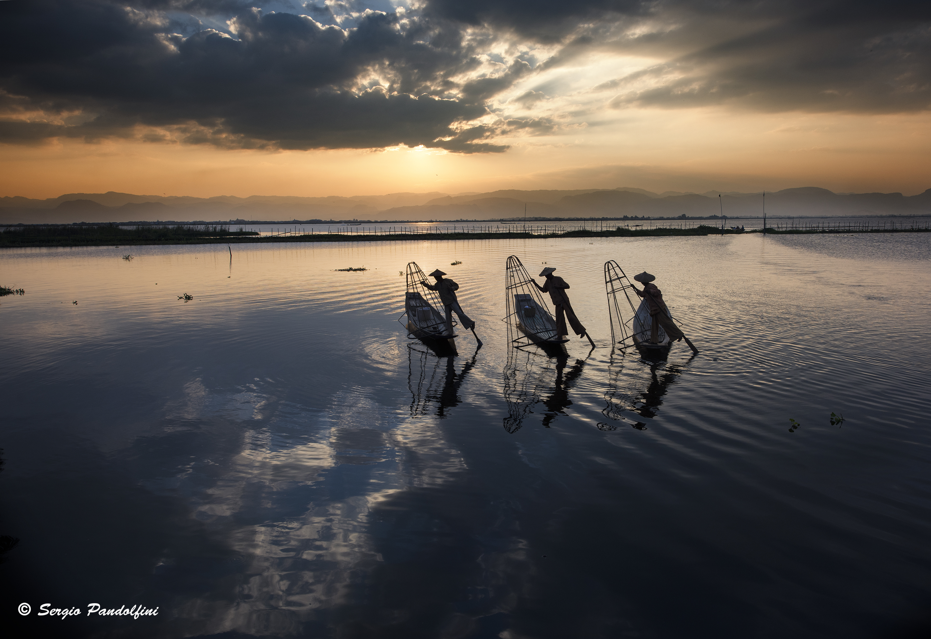 Fishermen in the sunset