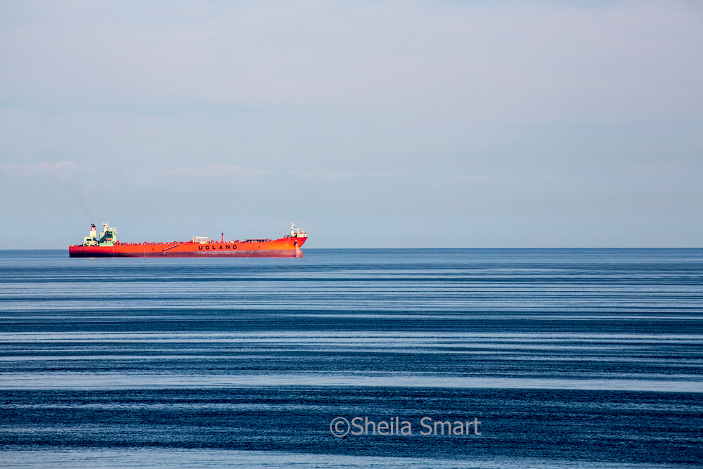 Red container boat, Ugland, in Baltic Sea web.jpg