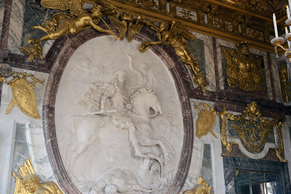 Stucco bas-relief of King Louis XIV on horseback trampling his enemies, The War Room, 1678-1686, Palace of Versailles