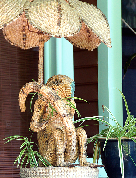 Porch, rattan monkey lamp.