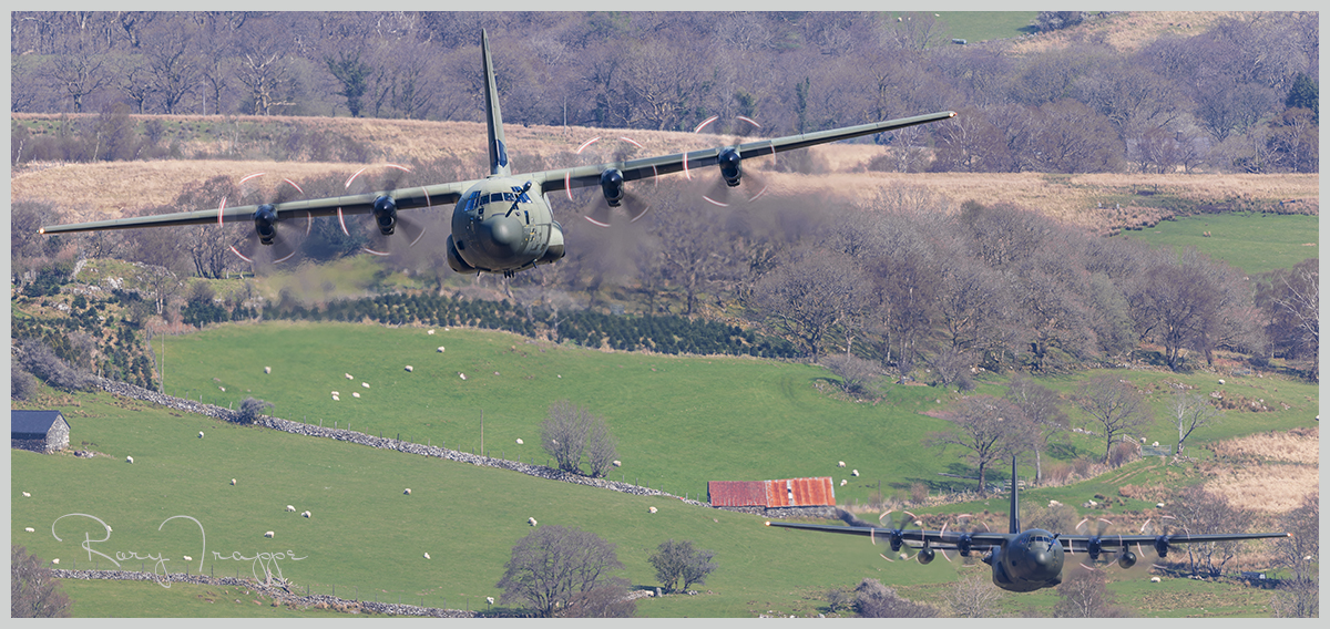 A pair of C-130 Hercules entering the Mach Loop from the North