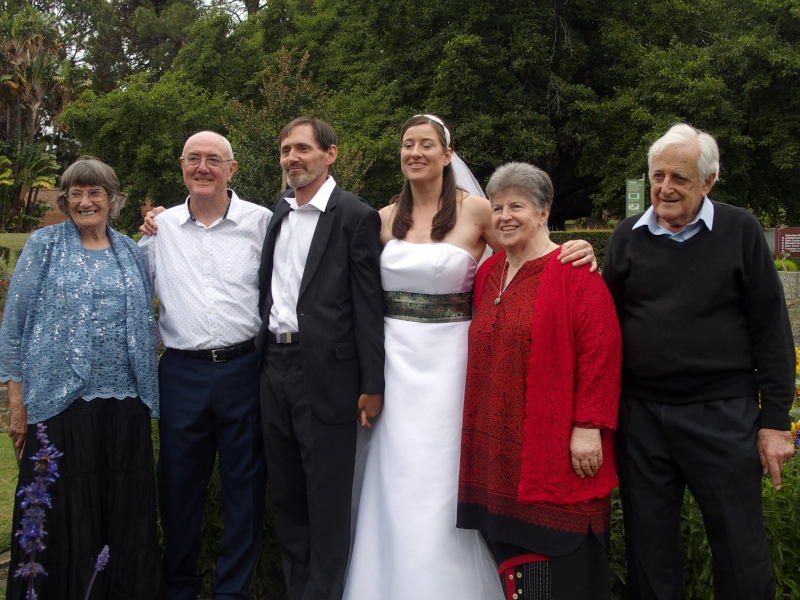 The happy couple with their happy parents