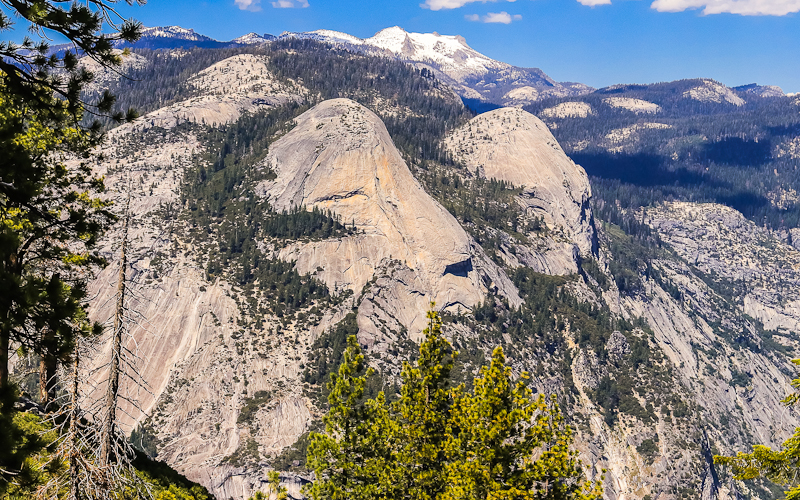 North Dome and Basket Dome with Mount Hoffman in the distance as seen from Glacier Point  in Yosemite National Park