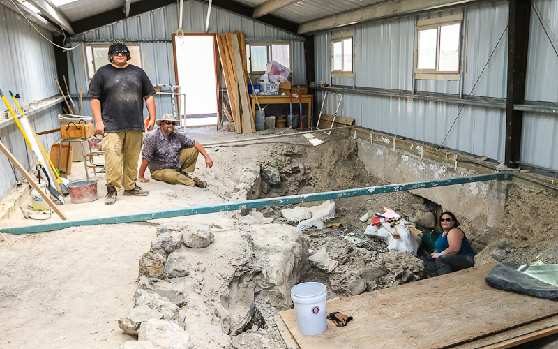 Paleontologist Steve Clawson (left) and team work the quarry in Building 1 in Jurassic National Monument