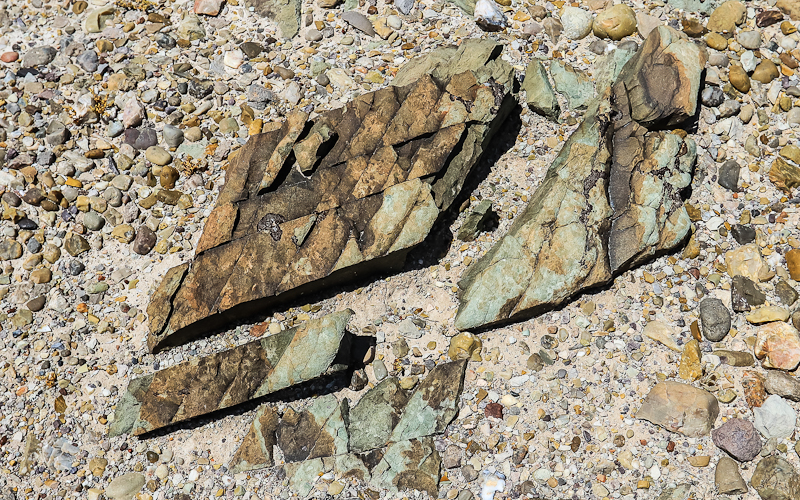 Broken rocks in a dry stream bed in Jurassic National Monument